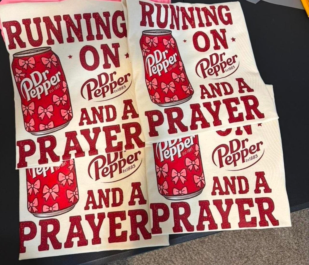 Running on Dr Pepper and a Prayer Tan Cotton Unisex T-Shirt